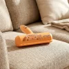 ChomChom pet hair remover roller with a bright orange handle and dog pattern.