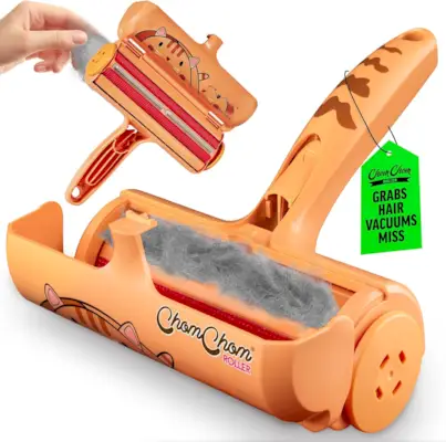 ChomChom pet hair remover roller with a bright orange handle and dog pattern.